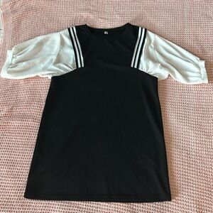 Faux blouse (white) sown into a mid length black dress.  Very comfortable